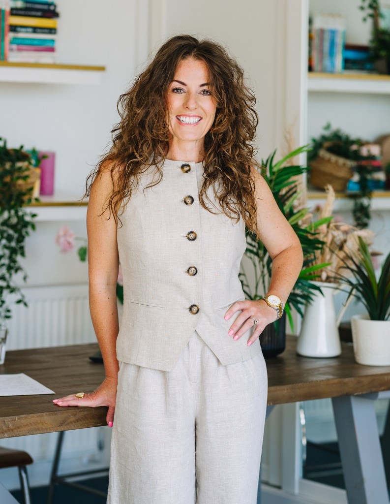 Lousha wearing beige two-piece