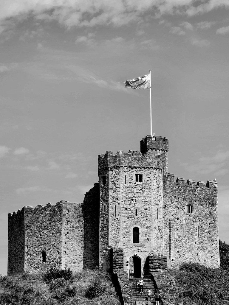 Welsh flag flying on Cardiff Castle's Norman tower